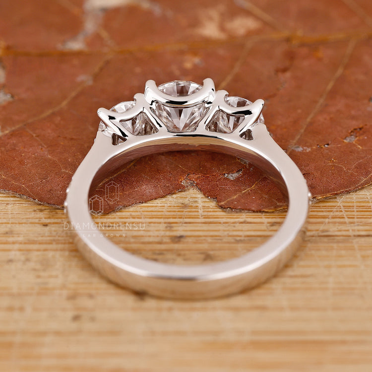Buy Engagement ring designed with tapered pave style.
