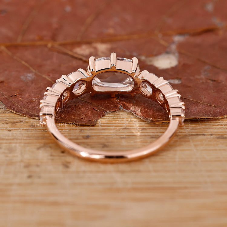 Tapered pavé setting ring with oval rose cut diamond in custom design.
