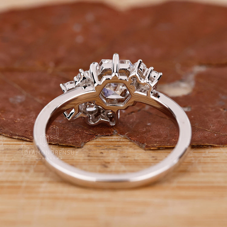 customise ring with marquise round side stone detail.
