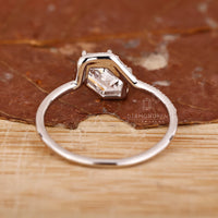Buy Engagement ring in bright white gold ring.
