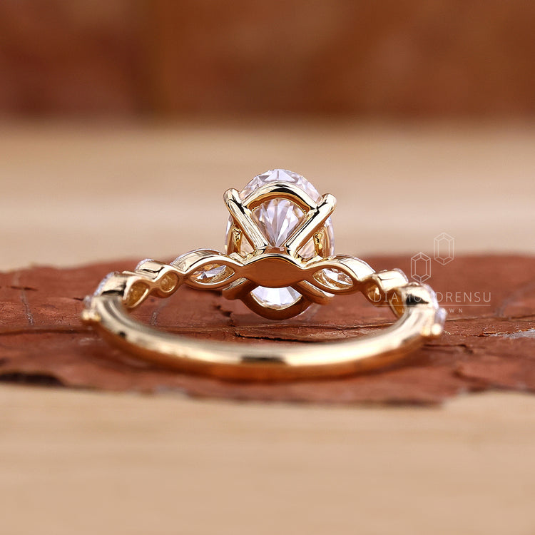 Pave band engagement ring with marquise and round cuts.
