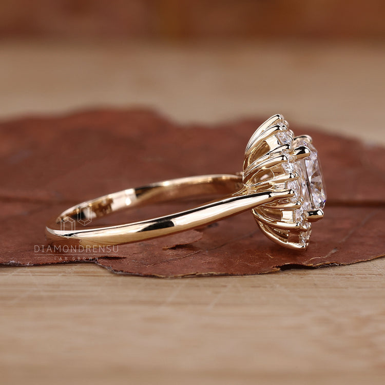 Round prong setting ring holding the diamond securely.
