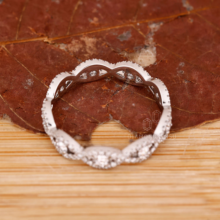 Buy Wedding Band in twisted white gold with full eternity stones.
