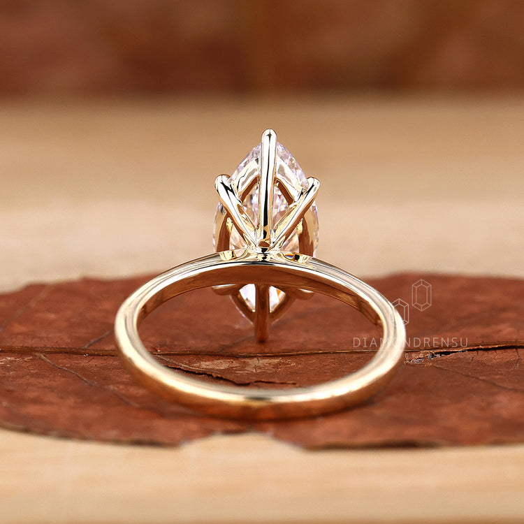 Lab grown diamond ring set in a marquise solitaire design.
