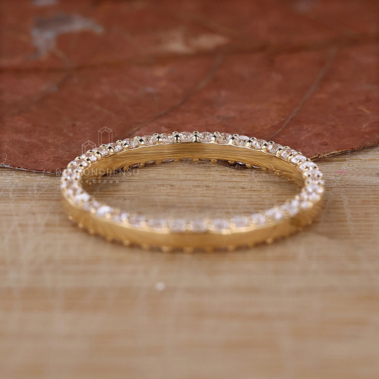 Diamondrensu CA wedding band made from lab grown stones.
