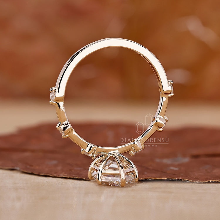 customise ring with round diamond side stones.
