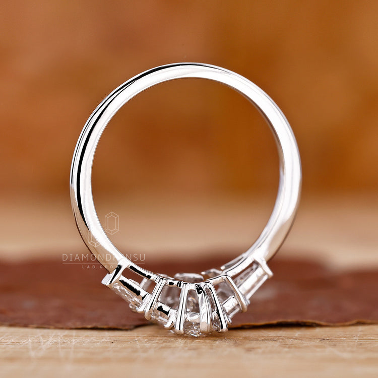 Lab Grown Diamond in marquise engagement ring.
