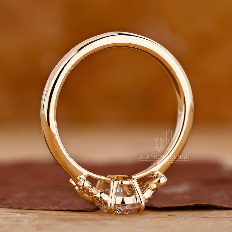 Lab Grown Diamond in butterfly setting engagement ring.
