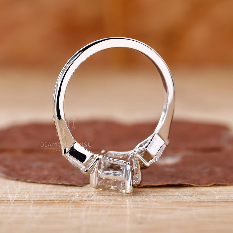 customise ring with kite side stones.

