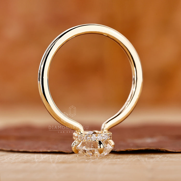 IGI certified engagement ring with cushion cut center stone.
