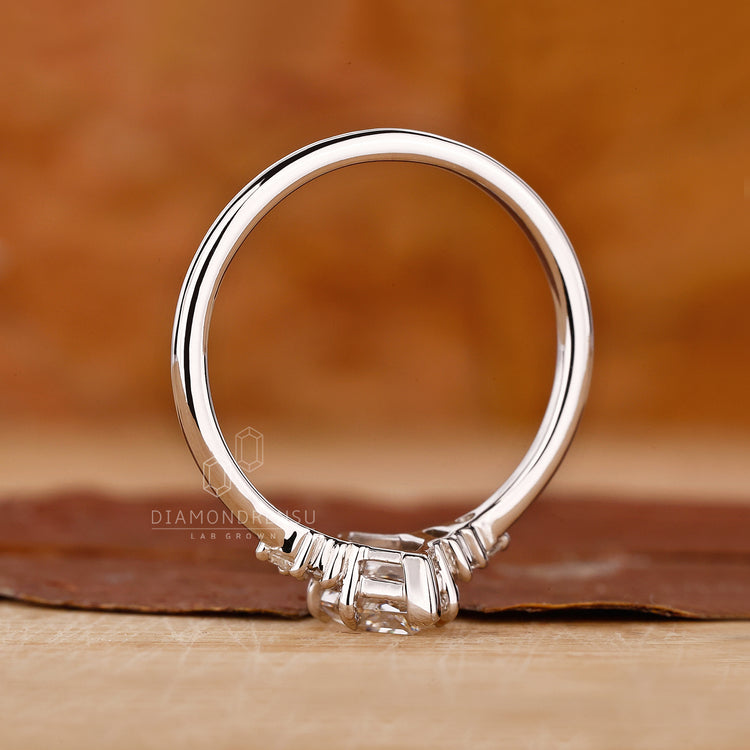 IGI certified muse setting ring with baguette stones.
