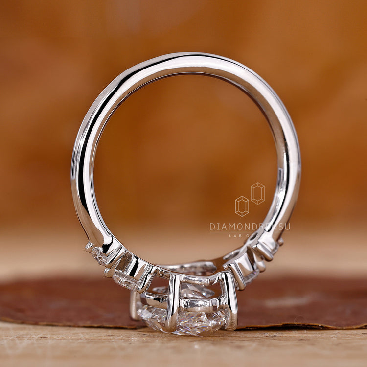Lab grown diamond ring with five stones in a prong setting style.
