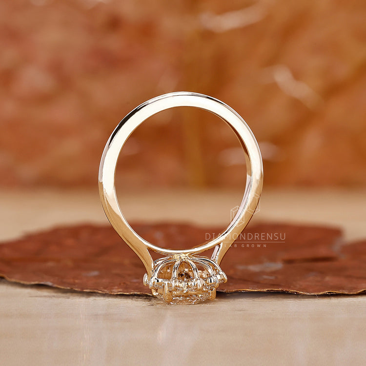 Lab Grown Diamond set in round cut diamond ring.
