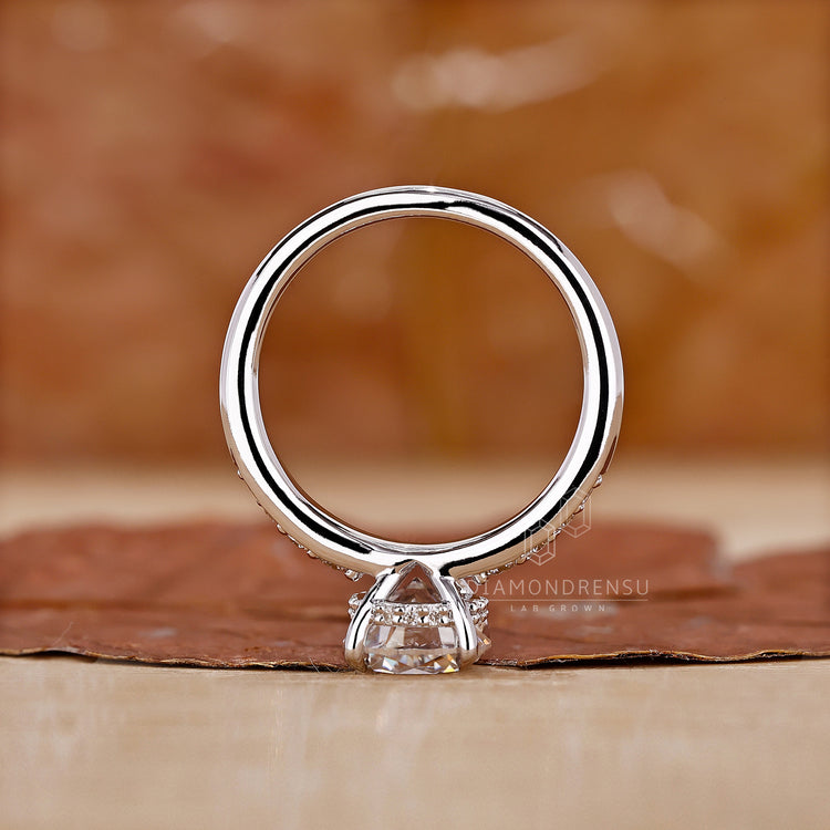 Lab Grown Diamond placed in round cut diamond ring.
