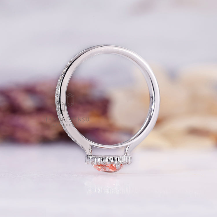 Buy engagement ring with pink diamond and white gold band.
