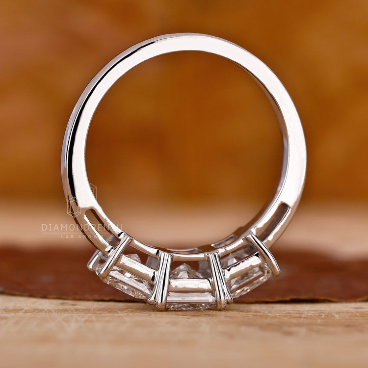 IGI certified diamond ring with a princess cut centre in a custom design.

