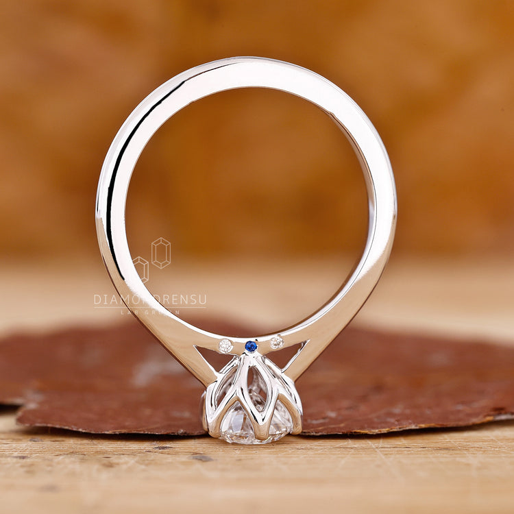 Blue sapphire diamond ring with white gold ring.

