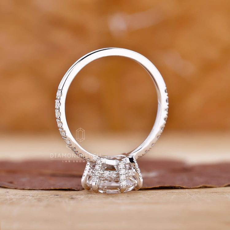 Buy engagement ring with hexagon diamond and pavé setting.

