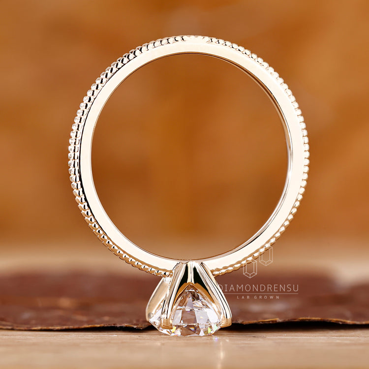 Handmade jewelry has round cut diamond ring.

