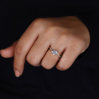 Round prong setting ring holding the diamond securely.
