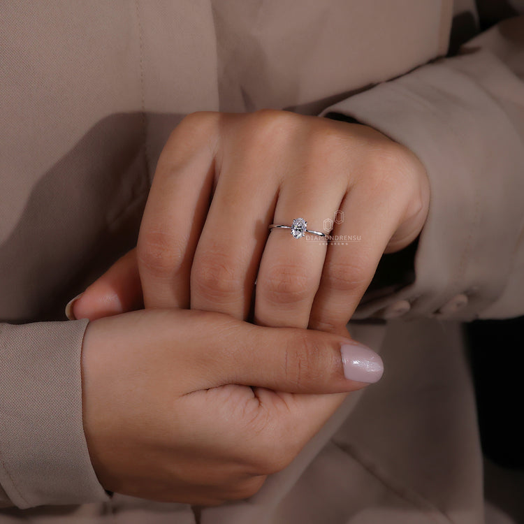 White gold engagement ring with a polished finish.
