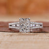 Radiant cut diamond ring set in white gold engagement ring.
