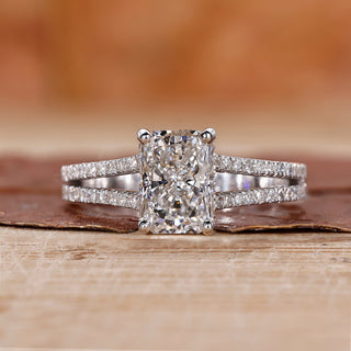 Radiant cut diamond ring set in white gold engagement ring.
