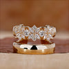 yellow gold diamond ring with prong setting detail.
