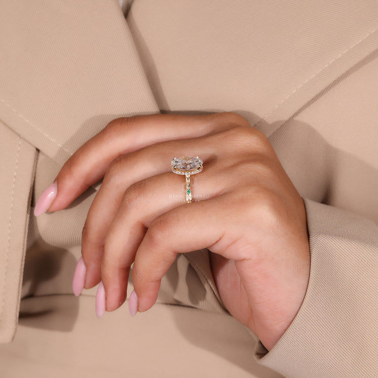 Emerald diamond ring designed as a custom handmade piece.
