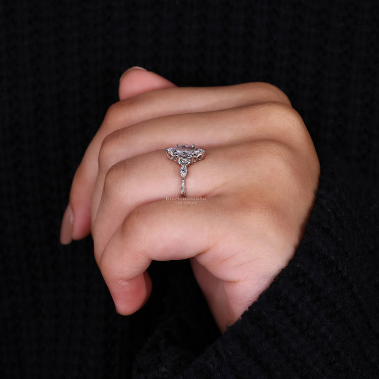 customise ring with round marquise side stones.

