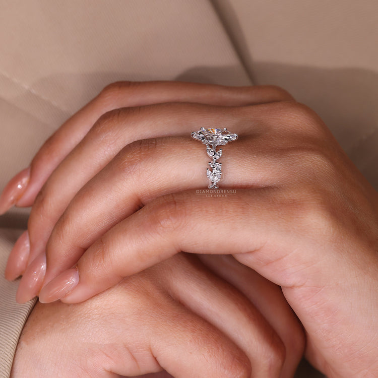 Customise ring with marquise cut centre stone and pavé side details.
