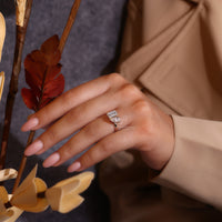 Yellow gold engagement ring and claw prong setting.
