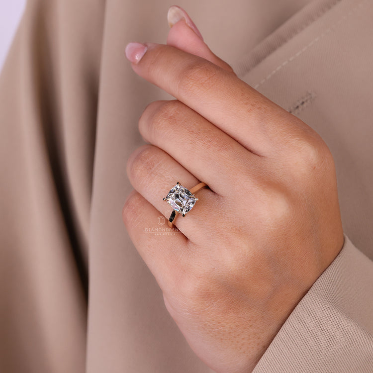 Cathedral setting ring with yellow gold engagement ring.
