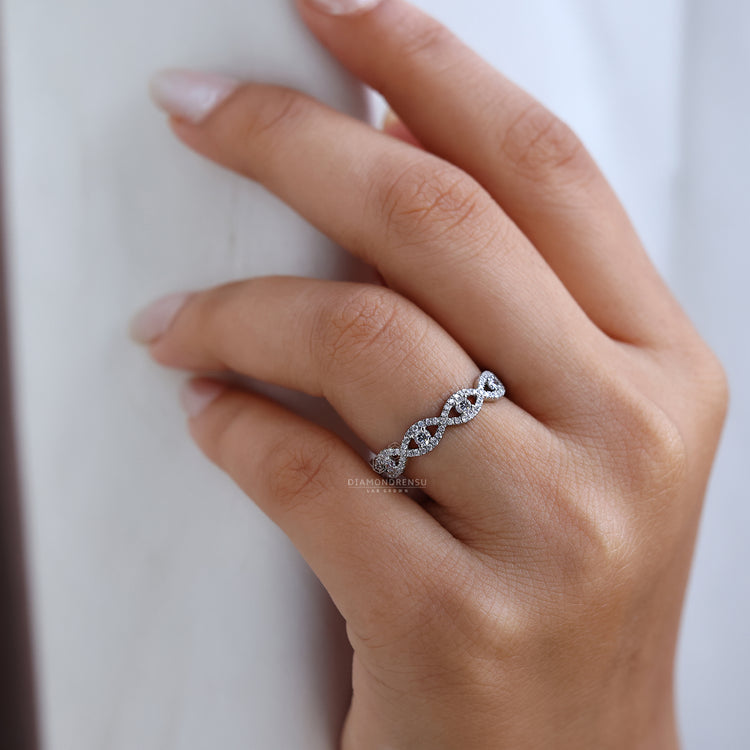 White Gold Ring featuring round diamonds in eternity style.
