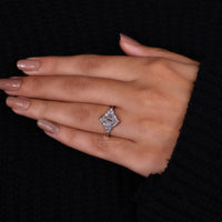 7 stone diamond ring in white gold ring setting.
