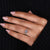 Engagement ring with six round prong setting

