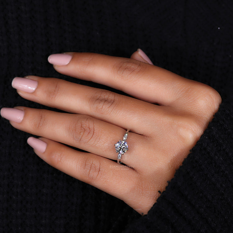 Engagement ring with six round prong setting

