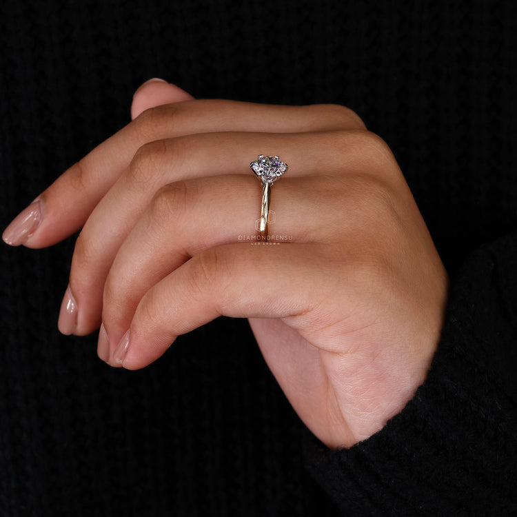 Handmade ring with knife edge shank and solitaire lab grown diamond.
