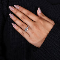 White gold engagement ring with 4 claw prong setting.
