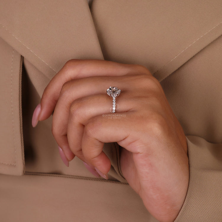 Custom diamond ring with round rose cut and pavé detail.
