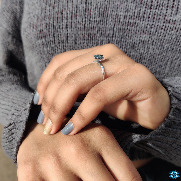 Oval Cut Engagement Ring with a claw prong setting and handmade craftsmanship.