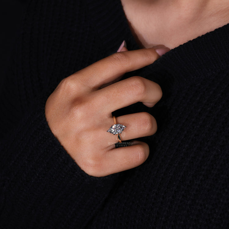 Unique two tone engagement ring blending modern and traditional styles.