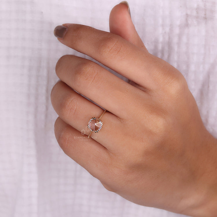 Milgrain setting crafted in a solitaire engagement ring.
