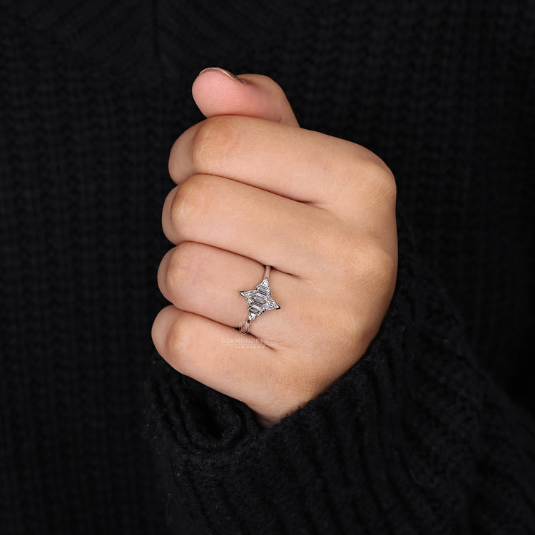 handmade ring with round with baguette side stones.
