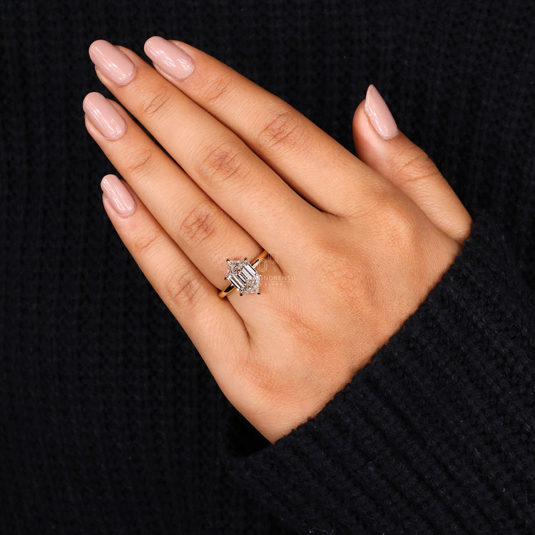 But engagement ring featuring a solitaire design and hexagon setting.
