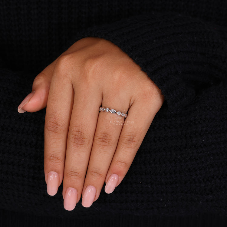 Diamond stacking band with round stones.