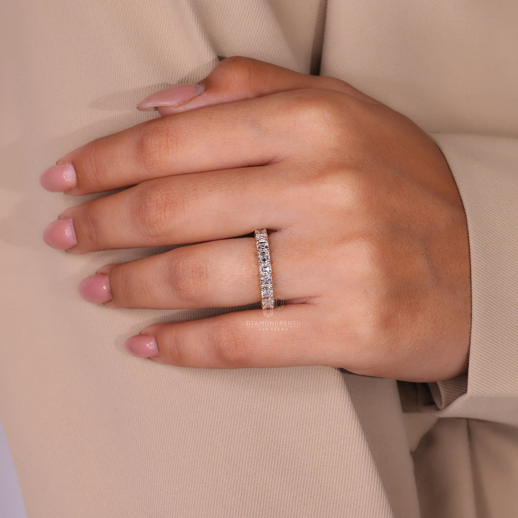Lab grown diamond in a half eternity wedding band.