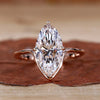 Marquise Diamond Engagement Ring with compass prong setting in rose gold.
