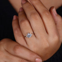 yellow gold diamond ring with 4 prong setting.
