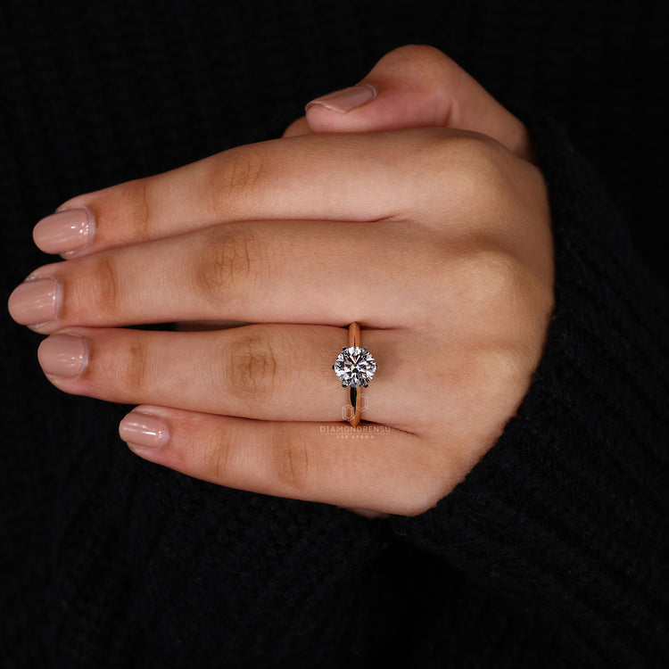 Knife edge shank ring featuring a lab grown diamond solitaire.
